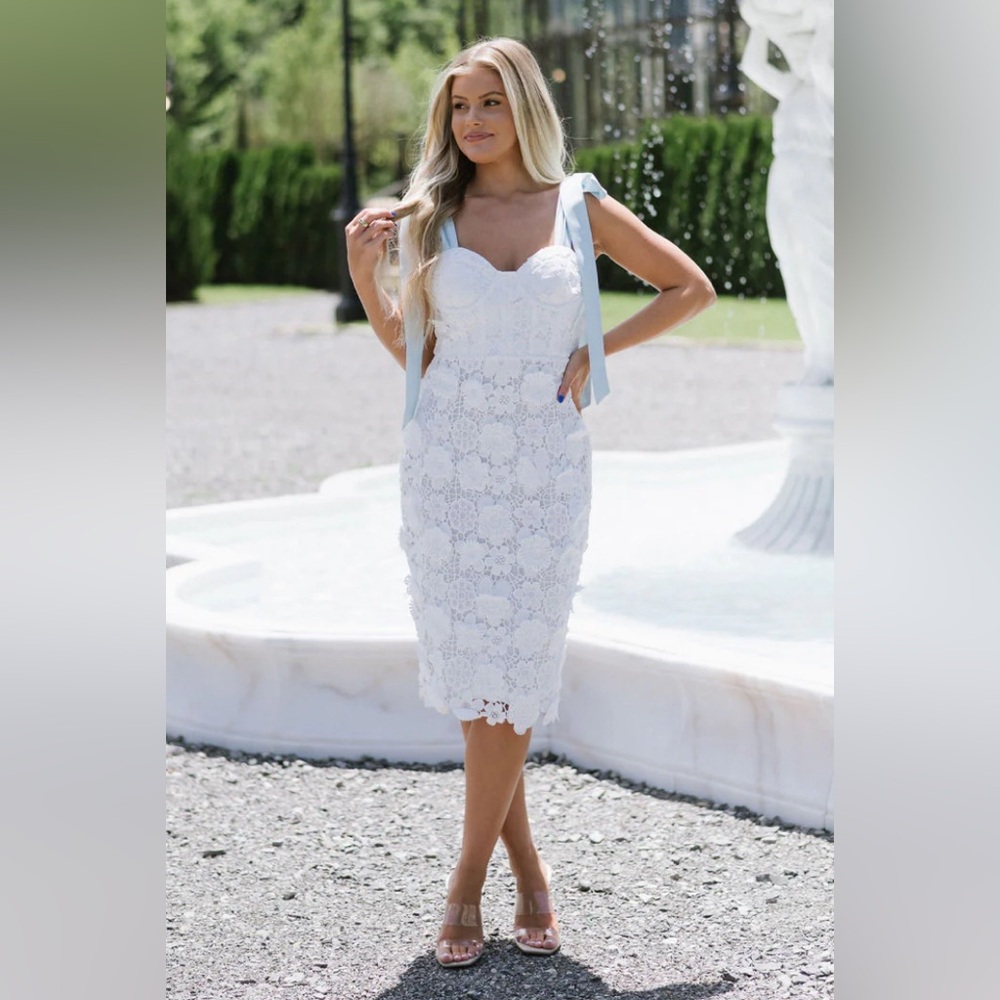 These three boutique white midi dress with blue adjustable bow straps